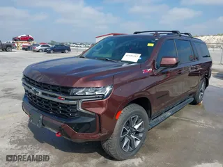 2022 Chevrolet Suburban Z71 with VIN 1GNSKDKD6NR153339, listed as a IAAI auction lot 41446443 with 49,261 mi miles. Bid and sale history available at carsss.com. Image 2.