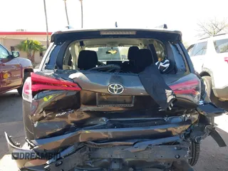 2016 Toyota RAV4 LE with VIN JTMBFREV4GJ052168, listed as a IAAI auction lot 41837564 with 73,659 mi miles. Bid and sale history available at carsss.com. Image 16.