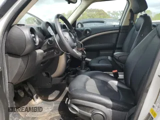 2015 MINI Countryman with VIN WMWZB3C52FWM33204, listed as a Copart auction lot 51680405 with 154,839 mi miles and Salvage Title. Bid and sale history available at DreamBid. Image 7.