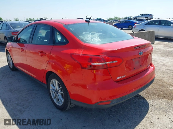 2016 Ford Focus SE with VIN 1FADP3F2XGL205797, listed as a IAAI auction lot 41987209 with 129,042 mi miles. Bid and sale history available at carsss.com. Image 3.
