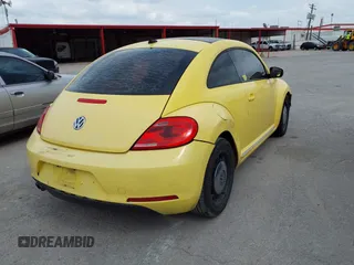 2013 Volkswagen Beetle 2.5L w/Sun/Sound/Nav with VIN 3VWJX7AT2DM680808, listed as a IAAI auction lot 42141906 with 113,399 mi miles and . Bid and sale history available at DreamBid. Image 4.