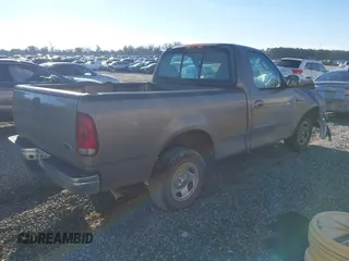 2002 Ford F-150 XL with VIN 1FTRF17W02NB01695, listed as a IAAI auction lot 41230523 with 398,649 mi miles. Bid and sale history available at carsss.com. Image 4.