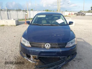 2014 Volkswagen Jetta SE with VIN 3VWD07AJ6EM417996, listed as a IAAI auction lot 42723125 with 108,952 mi miles and . Bid and sale history available at DreamBid. Image 12.
