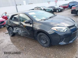 2015 Toyota Corolla L with VIN 5YFBURHE1FP352715, listed as a IAAI auction lot 41696284 with 121,906 mi miles and . Bid and sale history available at DreamBid. Image 1.
