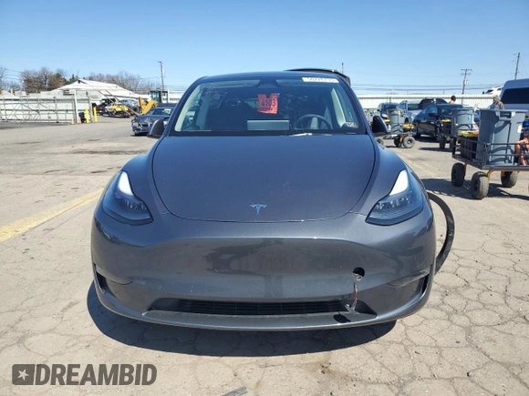 2023 Tesla Model Y Performance z VIN 7SAYGDEF9PF865129, wystawiony jako Copart lot #50228735 z przebiegiem Nie podano mil oraz Szkoda całkowita • Salvage title. Historia ofert i sprzedaży dostępna na DreamBid. Obrazek 5.