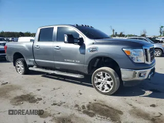2016 Nissan Titan XD PRO-4X with VIN 1N6BA1F47GN510491, listed as a Copart auction lot 77826454 with 102,285 mi miles and Clean Title. Bid and sale history available at carsss.com. Image 4.