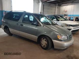 2000 Toyota Sienna LE with VIN 4T3ZF13CXYU299988, listed as a IAAI auction lot 42629949 with 212,264 mi miles and . Bid and sale history available at DreamBid. Image 1.