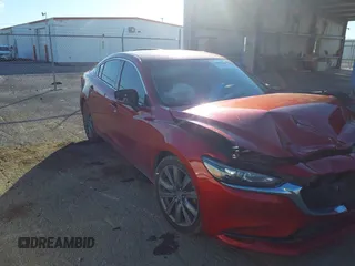 2018 Mazda Mazda6 Touring with VIN JM1GL1VM9J1317729, listed as a IAAI auction lot 41607338 with 140,832 mi miles. Bid and sale history available at carsss.com. Image 1.