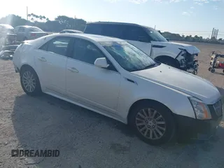 2011 Cadillac CTS Luxury with VIN 1G6DE5EY0B0159251, listed as a IAAI auction lot 41546996 with 159,205 mi miles and . Bid and sale history available at DreamBid. Image 1.