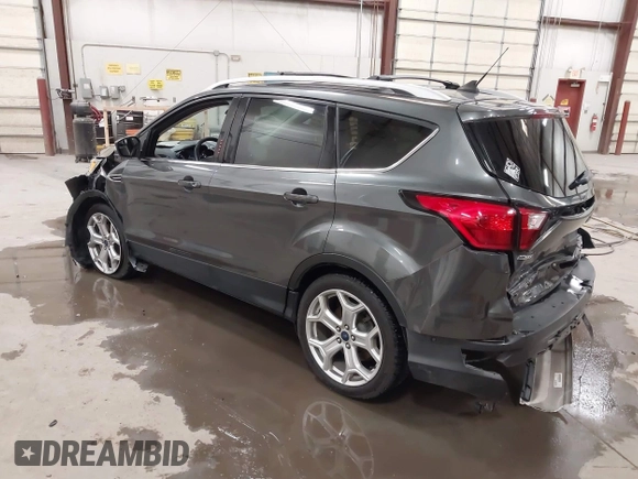 2019 Ford Escape Titanium with VIN 1FMCU9J91KUB11957, listed as a IAAI auction lot 41928264 with 72,460 mi miles. Bid and sale history available at carsss.com. Image 3.