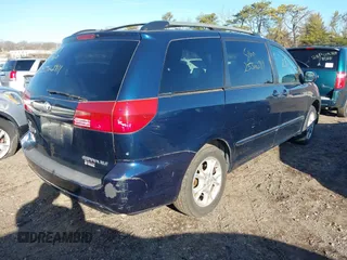 2005 Toyota Sienna XLE with VIN 5TDZA22C55S351384, listed as a IAAI auction lot 41841115 with 999,999 mi miles. Bid and sale history available at carsss.com. Image 4.