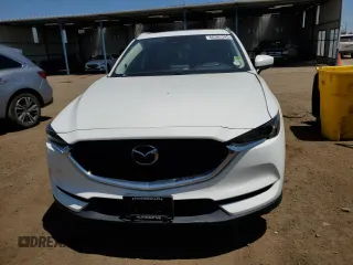 2018 Mazda CX-5 Grand Touring z VIN JM3KFBDM1J0473754, wystawiony jako Copart lot #60362245 z przebiegiem 72 792 mil mil oraz Szkoda całkowita • Salvage title. Historia ofert i sprzedaży dostępna na DreamBid. Obrazek 5.