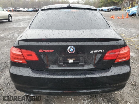 2012 BMW 3 Series 328i with VIN WBAKE5C59CJ106098, listed as a Copart auction lot 51977925 with 136,275 mi miles and Salvage title. Bid and sale history available at DreamBid. Image 6.
