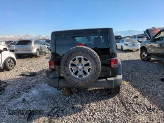 2013 Jeep Wrangler Unlimited Rubicon 10th Anniversary z VIN 1C4HJWFG6DL557085, wystawiony jako Copart lot #41693075 z przebiegiem 139 240 mil mil oraz Szkoda całkowita • Salvage title. Historia ofert i sprzedaży dostępna na DreamBid. Obrazek 6.