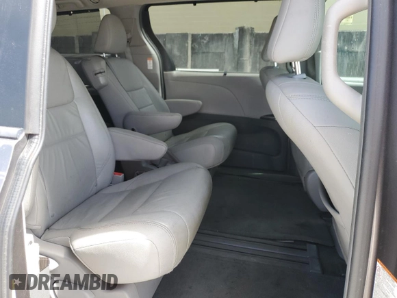 2015 Toyota Sienna XLE with VIN 5TDYK3DCXFS668851, listed as a Copart auction lot 60452005 with 205,549 mi miles and Salvage title. Bid and sale history available at DreamBid. Image 11.