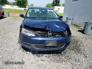 2014 Volkswagen Jetta SE z VIN 3VWD17AJ8EM413915, wystawiony jako Copart lot #62325025 z przebiegiem 131 112 mil mil oraz Szkoda całkowita • Salvage title. Historia ofert i sprzedaży dostępna na DreamBid. Obrazek 13.