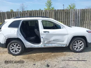 2016 Jeep Cherokee Altitude with VIN 1C4PJLAB9GW352580, listed as a IAAI auction lot 42044284 with 94,227 mi miles and . Bid and sale history available at DreamBid. Image 14.