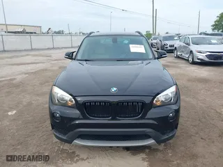 2014 BMW X1 sDrive28i with VIN WBAVM1C54EVW46561, listed as a IAAI auction lot 41880387 with 125,096 mi miles. Bid and sale history available at carsss.com. Image 12.