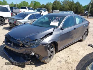 2019 Honda Civic Sport with VIN 19XFC2F88KE028035, listed as a IAAI auction lot 42000936 with 51,666 mi miles and . Bid and sale history available at DreamBid. Image 16.