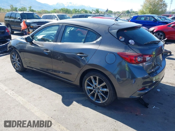 2018 Mazda 3 Touring with VIN 3MZBN1L34JM164952, listed as a IAAI auction lot 42179420 with 106,706 mi miles and . Bid and sale history available at DreamBid. Image 3.