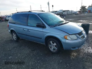 2005 Dodge Caravan SXT with VIN 1D4GP45R35B163054, listed as a IAAI auction lot 41529335 with 138,483 mi miles. Bid and sale history available at carsss.com. Image 1.