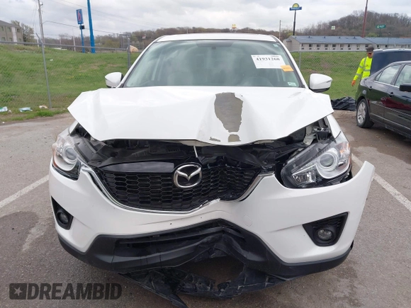2015 Mazda CX-5 Touring with VIN JM3KE2CY3F0550624, listed as a IAAI auction lot 41931268 with 51,588 mi miles and . Bid and sale history available at carsss.com. Image 12.