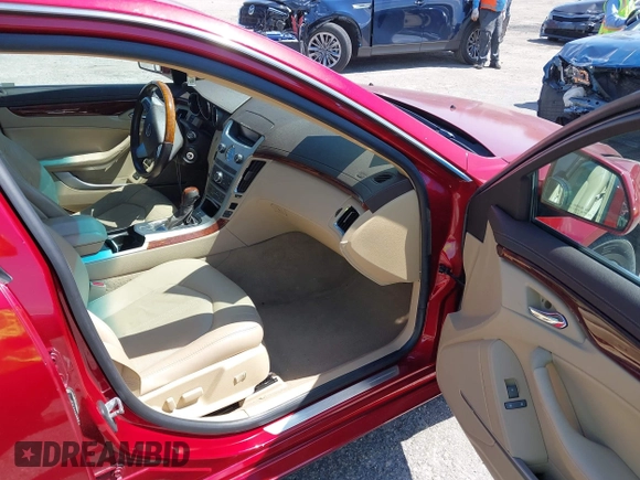 2009 Cadillac CTS RWD w/1SA with VIN 1G6DF577290142964, listed as a IAAI auction lot 42017475 with 171,696 mi miles. Bid and sale history available at carsss.com. Image 5.