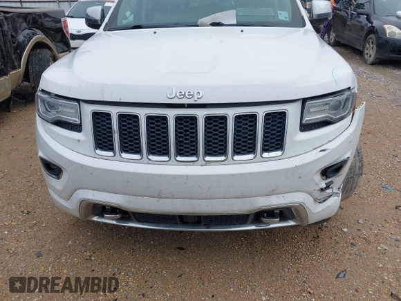 2014 Jeep Grand Cherokee Overland with VIN 1C4RJECG4EC543092, listed as a IAAI auction lot 40981315 with 149,096 mi miles. Bid and sale history available at carsss.com. Image 13.