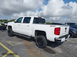 2016 Chevrolet Silverado 1500 LT with VIN 3GCUKREC3GG116107, listed as a IAAI auction lot 41490638 with 93,669 mi miles. Bid and sale history available at carsss.com. Image 3.