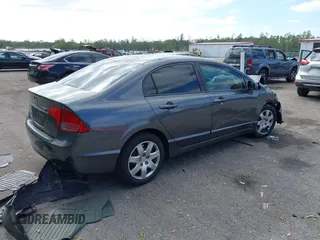2010 Honda Civic LX with VIN 2HGFA1F58AH561450, listed as a IAAI auction lot 42155330 with 108,569 mi miles and . Bid and sale history available at DreamBid. Image 4.