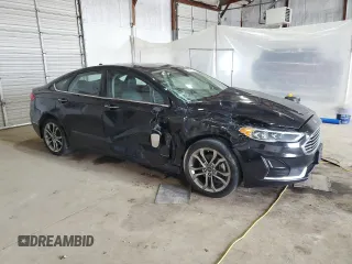 2020 Ford Fusion SEL z VIN 3FA6P0CD3LR117683, wystawiony jako Copart lot #52699725 z przebiegiem 115 248 mil mil oraz Szkoda całkowita • Salvage title. Historia ofert i sprzedaży dostępna na DreamBid. Obrazek 4.