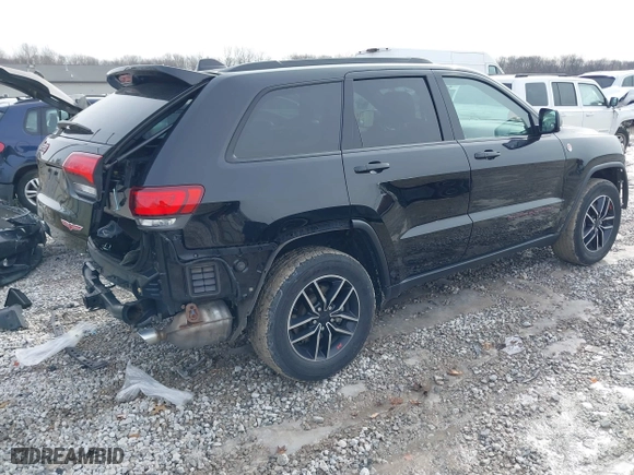 2019 Jeep Grand Cherokee Trailhawk with VIN 1C4RJFLTXKC696820, listed as a IAAI auction lot 41443851 with 50,848 mi miles. Bid and sale history available at carsss.com. Image 4.