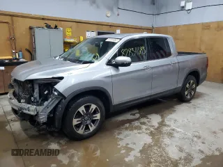 2017 Honda Ridgeline RTL-E with VIN 5FPYK3F71HB030020, listed as a Copart auction lot 82834683 with 102,111 mi miles and Salvage title. Bid and sale history available at DreamBid. Image 1.