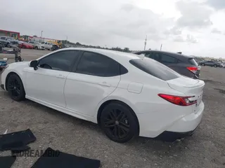 2025 Toyota Camry LE with VIN 4T1DAACK6SU531129, listed as a IAAI auction lot 41969220 with 10,542 mi miles and . Bid and sale history available at DreamBid. Image 3.