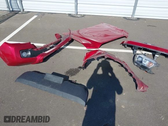 2021 Toyota Tacoma SR z VIN 5TFCZ5AN8MX247421, wystawiony jako IAAI lot #42147910 z przebiegiem 94 467 mil mil oraz . Historia ofert i sprzedaży dostępna na DreamBid. Obrazek 12.