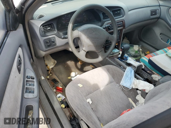1999 Nissan Altima XE with VIN 1N4DL01D9XC154778, listed as a Copart auction lot 75074664 with 119,284 mi miles and Non Repairable. Bid and sale history available at carsss.com. Image 8.
