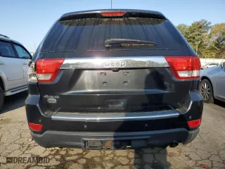 2012 Jeep Grand Cherokee Overland with VIN 1C4RJFCG4CC292383, listed as a Copart auction lot 51168385 with 132,697 mi miles and Salvage Title. Bid and sale history available at carsss.com. Image 6.