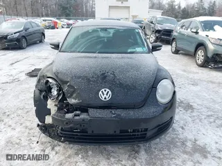 2012 Volkswagen Beetle 2.5L PZEV with VIN 3VWJP7AT8CM619137, listed as a IAAI auction lot 41195954 with 157,741 mi miles. Bid and sale history available at carsss.com. Image 12.