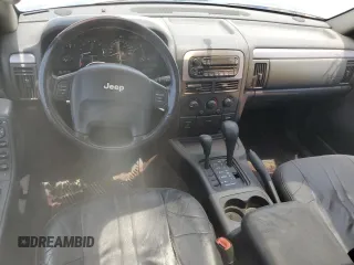 2002 Jeep Grand Cherokee Laredo with VIN 1J4GW48S52C242434, listed as a Copart auction lot 62859835 with 171,342 mi miles and Clean title. Bid and sale history available at DreamBid. Image 8.