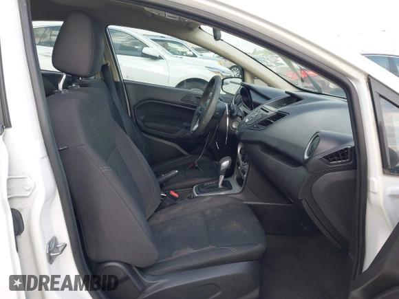 2017 Ford Fiesta SE z VIN 3FADP4BJ1HM126375, wystawiony jako IAAI lot #42244318 z przebiegiem 70 829 mil mil oraz . Historia ofert i sprzedaży dostępna na DreamBid. Obrazek 5.
