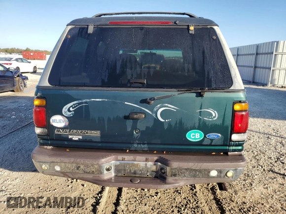 1997 Ford Explorer XL with VIN 1FMDU34E5VZB40878, listed as a Copart auction lot 84009744 with 185,047 mi miles and Salvage title. Bid and sale history available at DreamBid. Image 6.