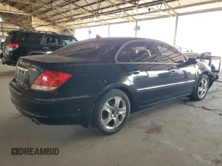 2005 Acura RL z VIN JH4KB16575C011187, wystawiony jako Copart lot #60276655 z przebiegiem 107 378 mil mil oraz Szkoda całkowita • Salvage title. Historia ofert i sprzedaży dostępna na DreamBid. Obrazek 3.
