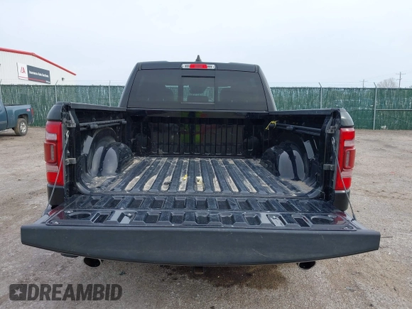 2023 Ram 1500 Limited with VIN 1C6SRFHT2PN541975, listed as a IAAI auction lot 41930788 with Not provided miles and . Bid and sale history available at DreamBid. Image 16.