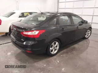 2014 Ford Focus SE with VIN 1FADP3F29EL287969, listed as a IAAI auction lot 41321168 with 98,898 mi miles. Bid and sale history available at carsss.com. Image 4.