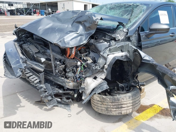 2018 Ford Fusion Hybrid SE with VIN 3FA6P0LU1JR116139, listed as a IAAI auction lot 41933594 with 83,000 mi miles. Bid and sale history available at carsss.com. Image 6.