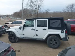 2014 Jeep Wrangler Unlimited Sahara with VIN 1C4BJWEGXEL326585, listed as a IAAI auction lot 41712047 with 155,973 mi miles. Bid and sale history available at carsss.com. Image 14.