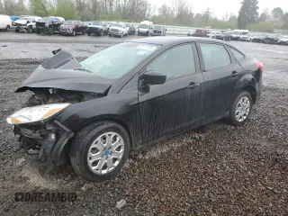 2012 Ford Focus SE z VIN 1FAHP3F24CL337918, wystawiony jako Copart lot #52177195 z przebiegiem 161 179 mil mil oraz Szkoda całkowita • Salvage title. Historia ofert i sprzedaży dostępna na DreamBid. Obrazek 1.