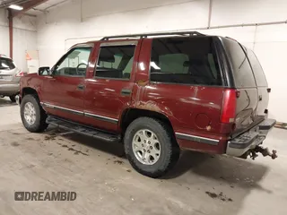 1999 GMC Yukon with VIN 1GKEK13R3XJ700930, listed as a IAAI auction lot 40915481 with 249,773 mi miles. Bid and sale history available at carsss.com. Image 3.