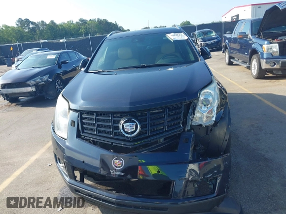 2014 Cadillac SRX Performance Collection with VIN 3GYFNCE39ES613051, listed as a IAAI auction lot 42113063 with 82,952 mi miles and . Bid and sale history available at carsss.com. Image 12.