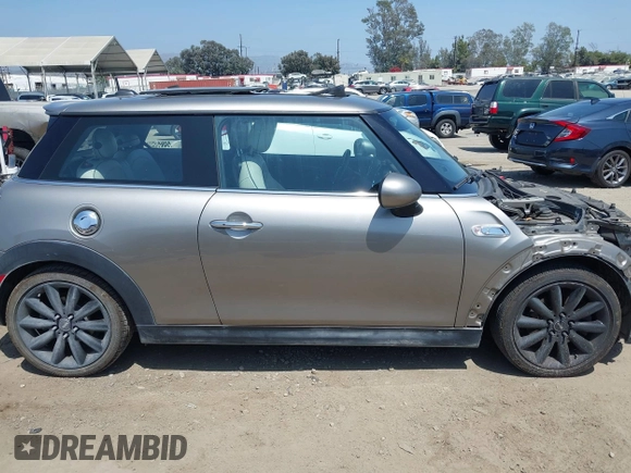 2017 MINI Hardtop Cooper S with VIN WMWXP7C34H2C61768, listed as a IAAI auction lot 42579522 with 67,876 mi miles and . Bid and sale history available at DreamBid. Image 14.